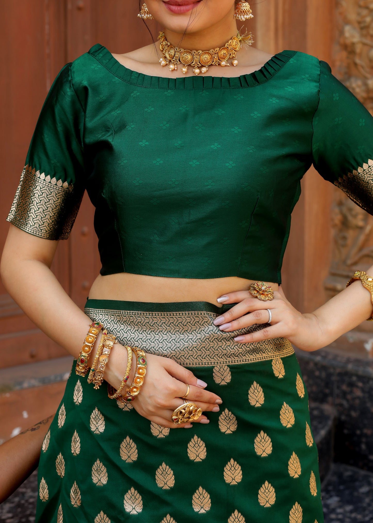 Bottle Green Katan Litchi Silk Banarasi Saree with Rich Golden Zari Butta Woven