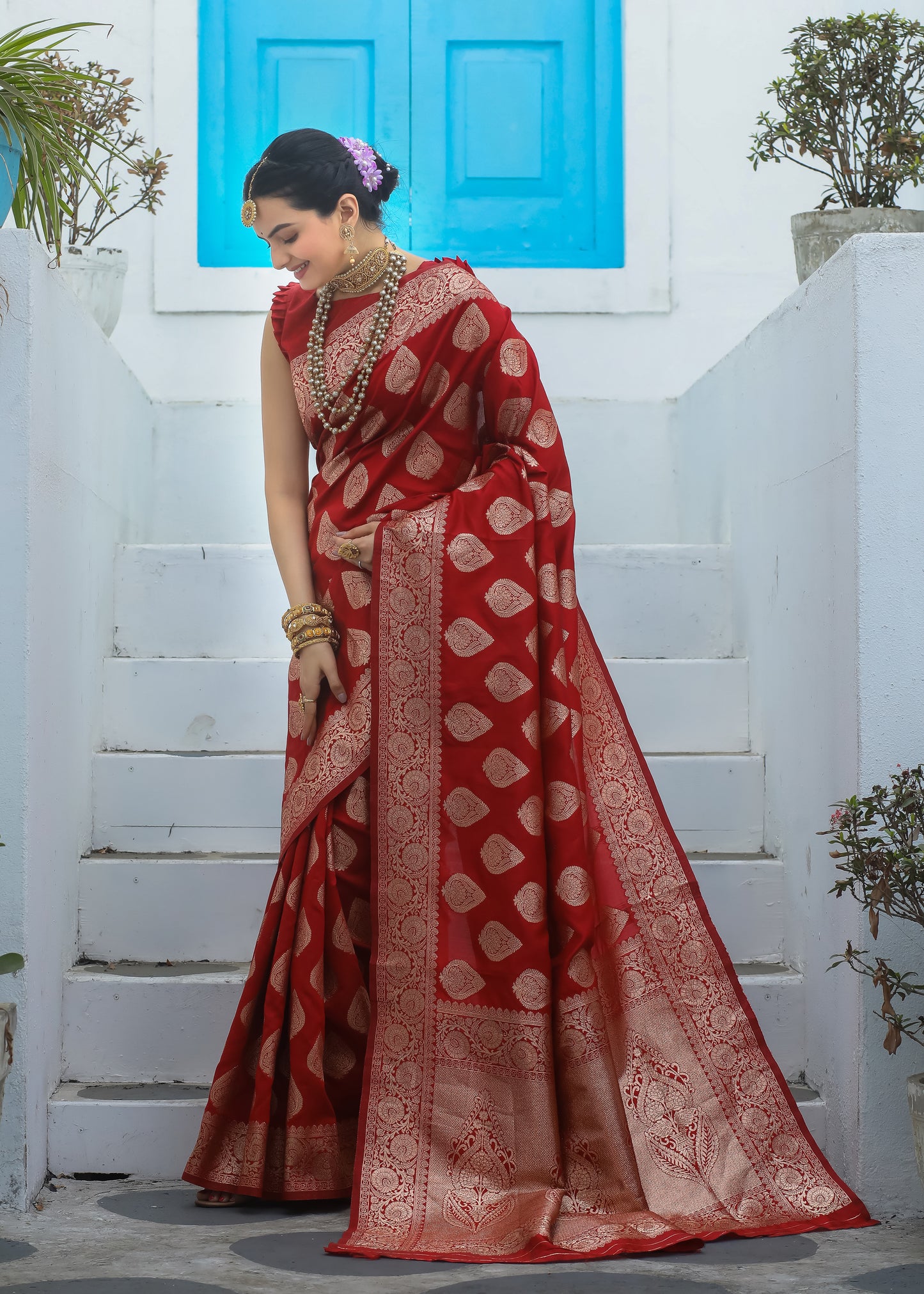 Exclusive Red Katan Litchi Silk Banarasi Saree Featuring Intricately Woven Zari Buttas