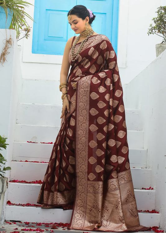 Luxurious Maroon Katan Litchi Silk Banarasi Saree Featuring Intricate Golden Zari Butta