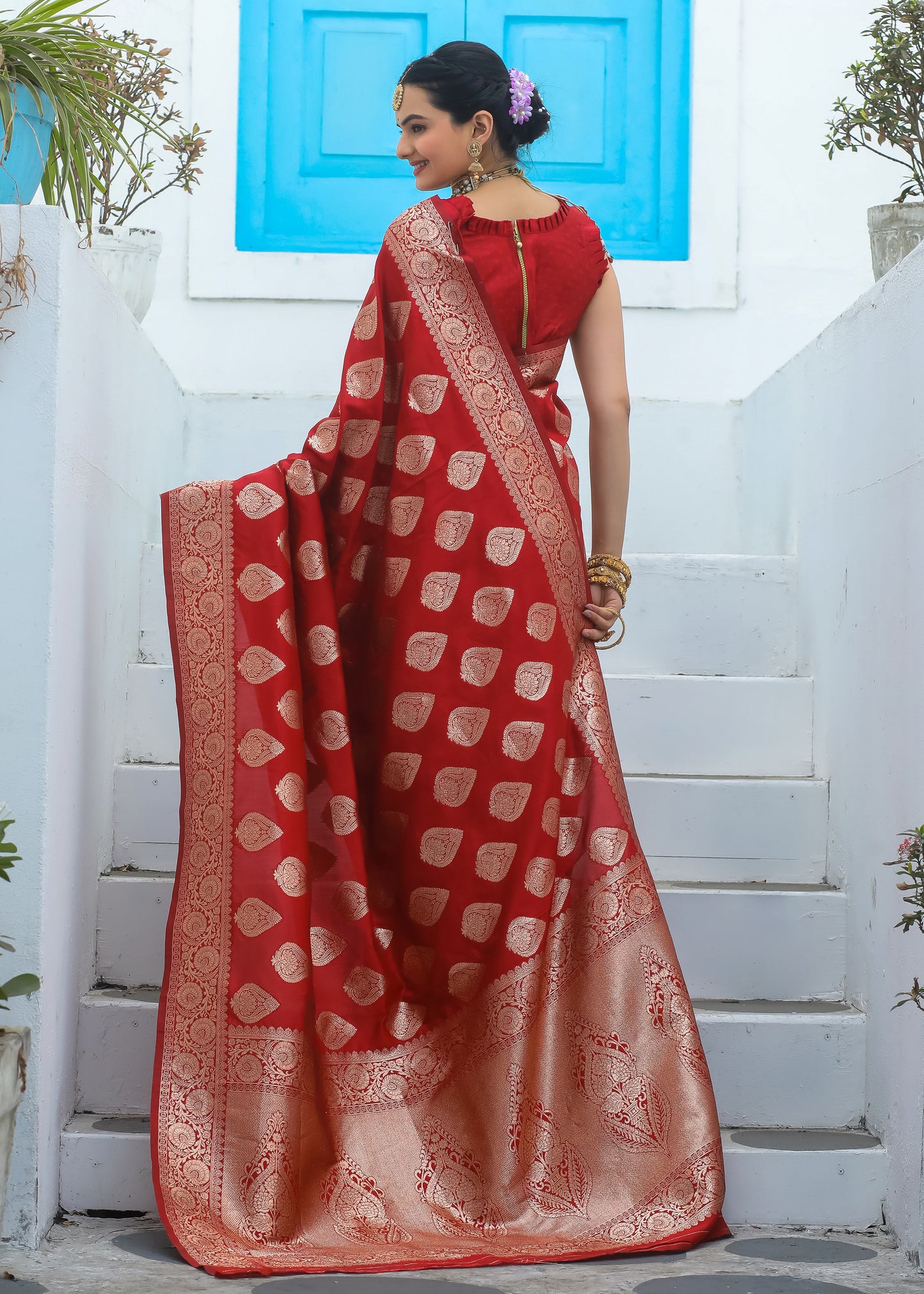 Exclusive Red Katan Litchi Silk Banarasi Saree Featuring Intricately Woven Zari Buttas