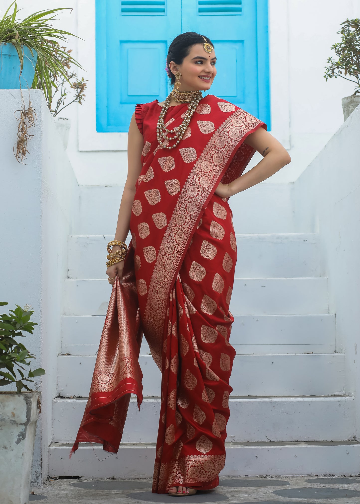 Exclusive Red Katan Litchi Silk Banarasi Saree Featuring Intricately Woven Zari Buttas