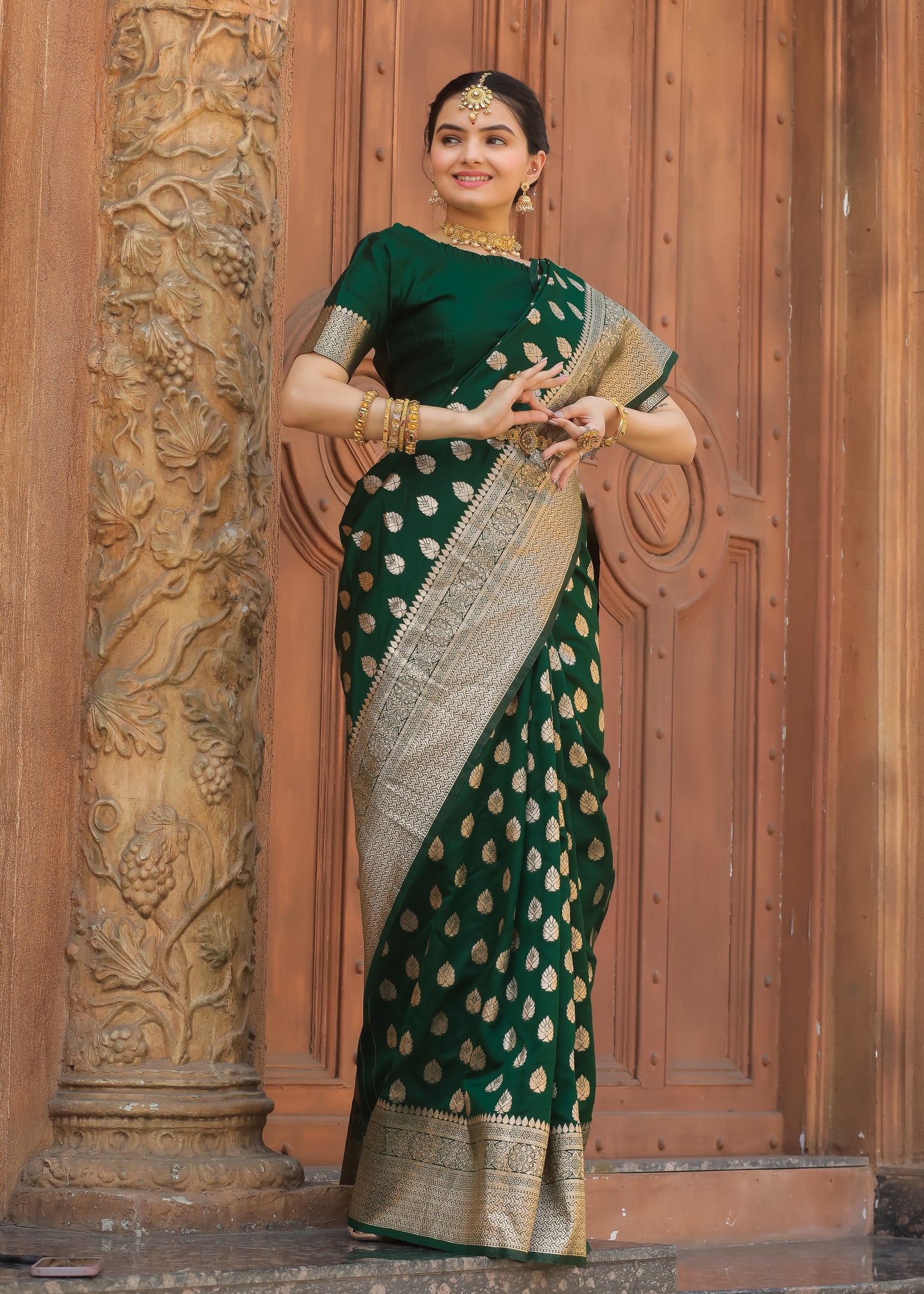 Bottle Green Katan Litchi Silk Banarasi Saree with Rich Golden Zari Butta Woven