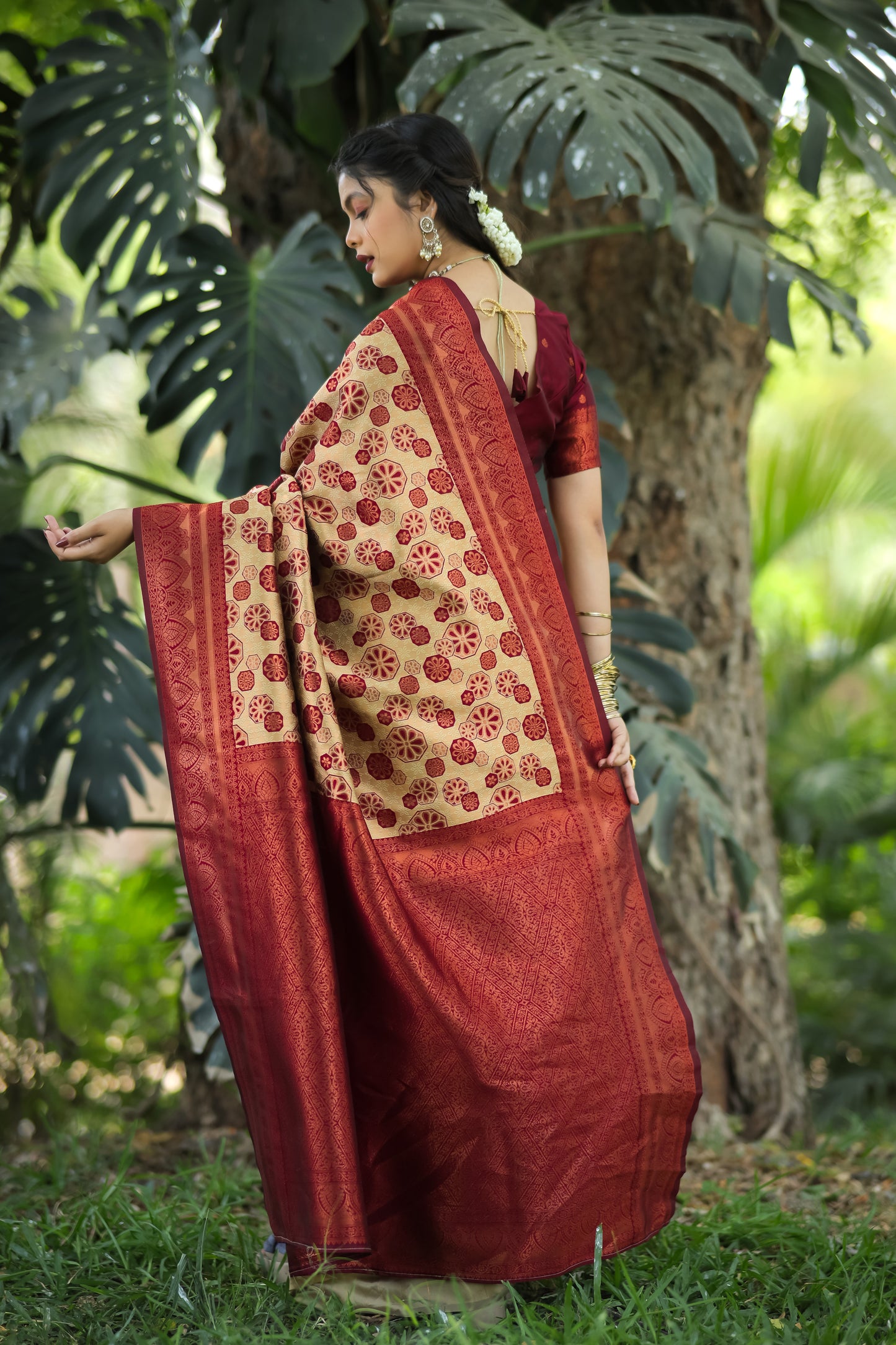Chiku Maroon Litchi Soft Silk Banarasi Saree with Floral Zari Woven Work