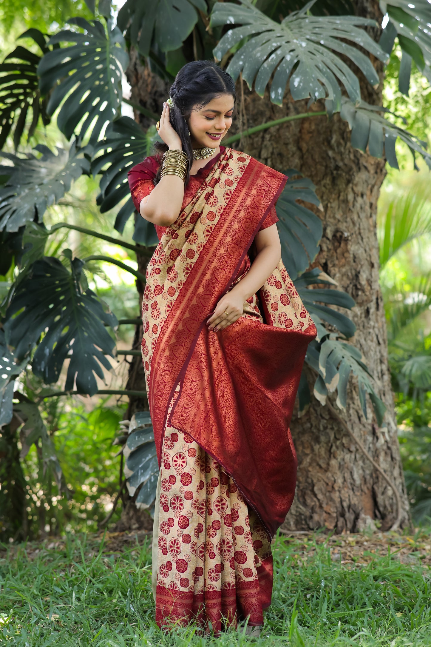 Chiku Maroon Litchi Soft Silk Banarasi Saree with Floral Zari Woven Work