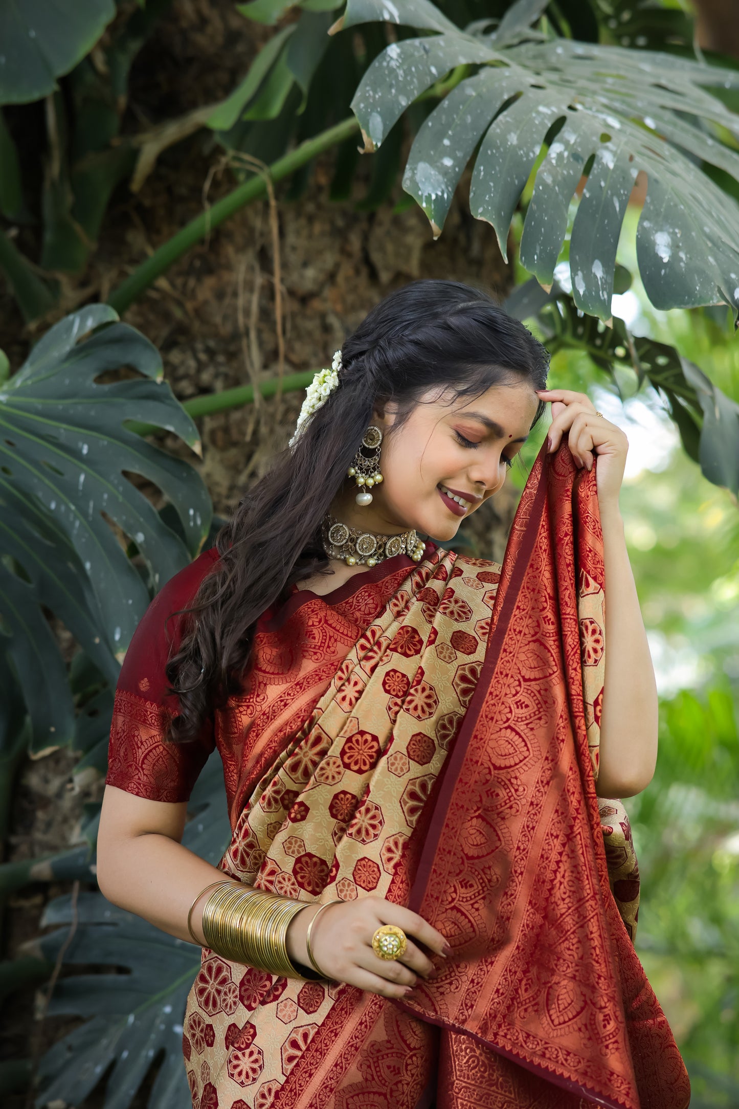 Chiku Maroon Litchi Soft Silk Banarasi Saree with Floral Zari Woven Work