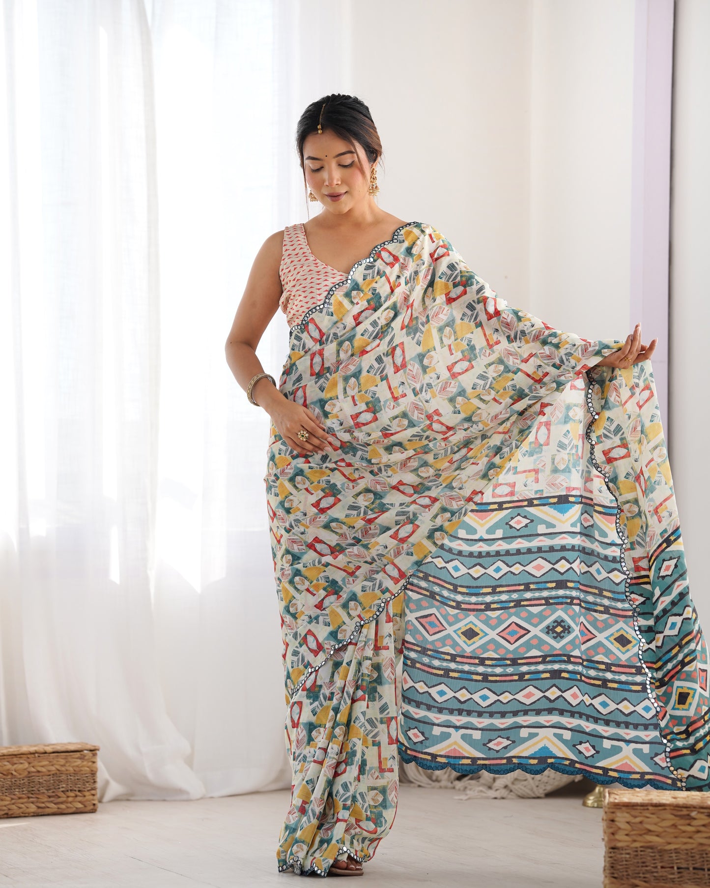 Cream Heavy Chinnon Saree with Print and Kutchi Mirror Lace Border