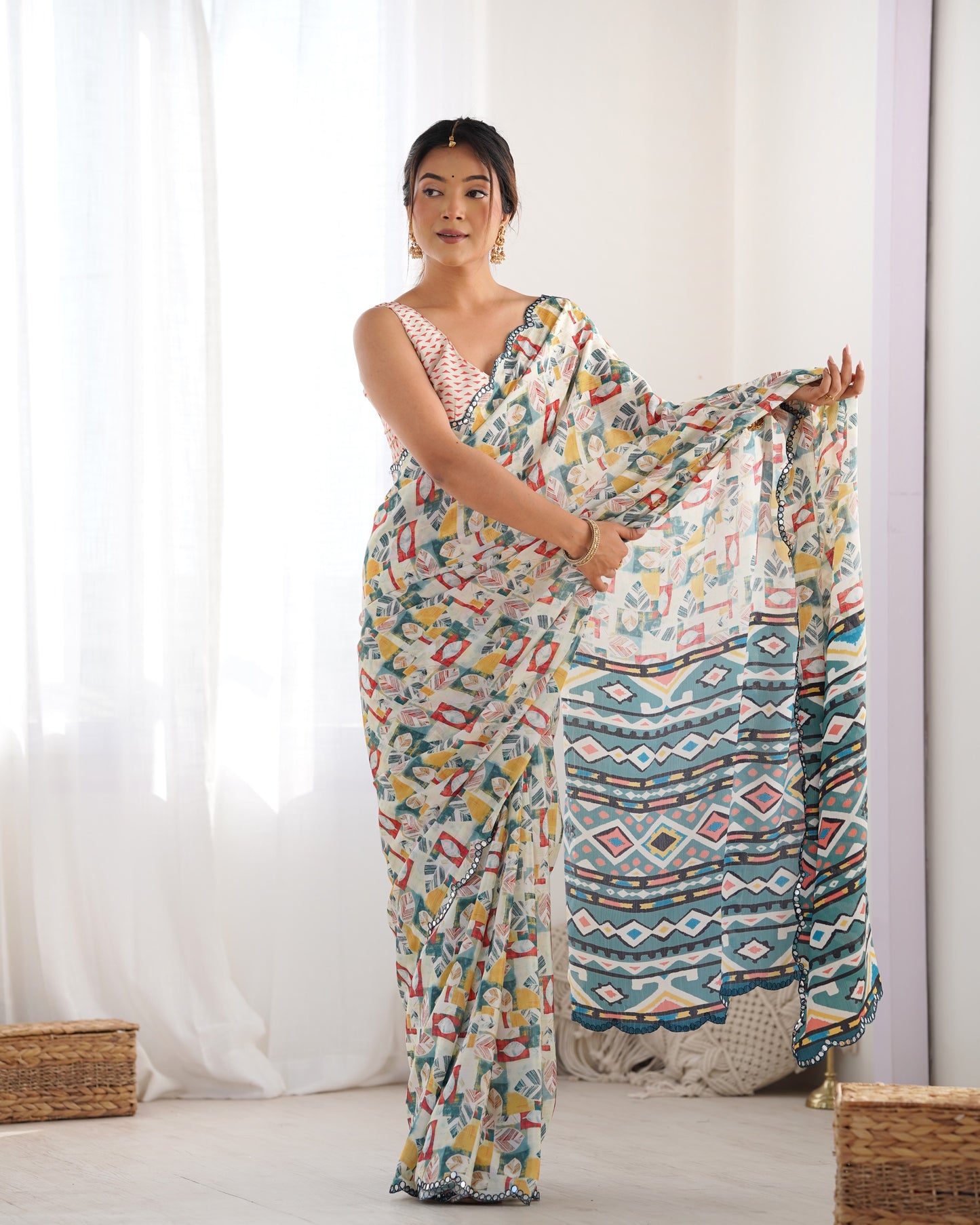 Cream Heavy Chinnon Saree with Print and Kutchi Mirror Lace Border