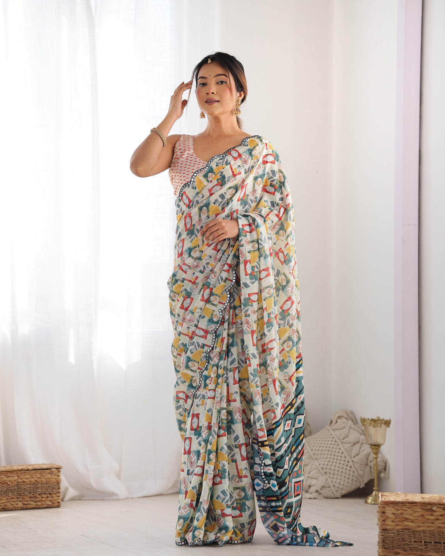 Cream Heavy Chinnon Saree with Print and Kutchi Mirror Lace Border