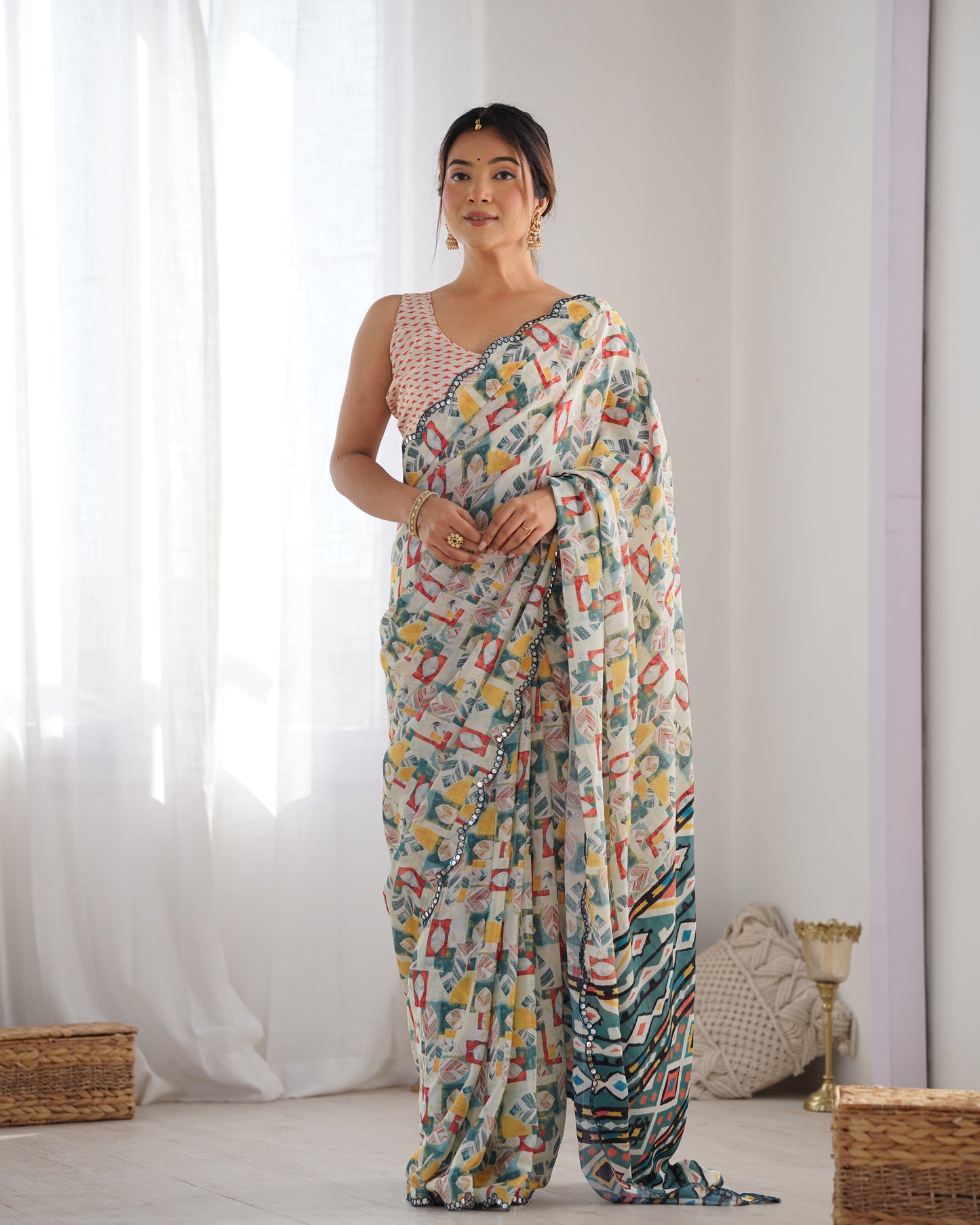 Cream Heavy Chinnon Saree with Print and Kutchi Mirror Lace Border