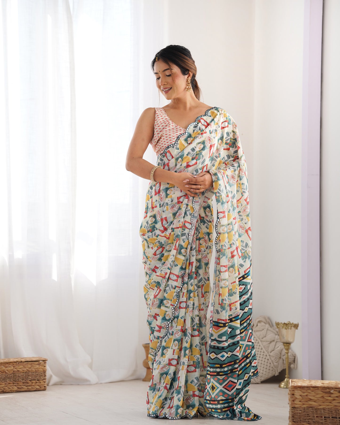 Cream Heavy Chinnon Saree with Print and Kutchi Mirror Lace Border