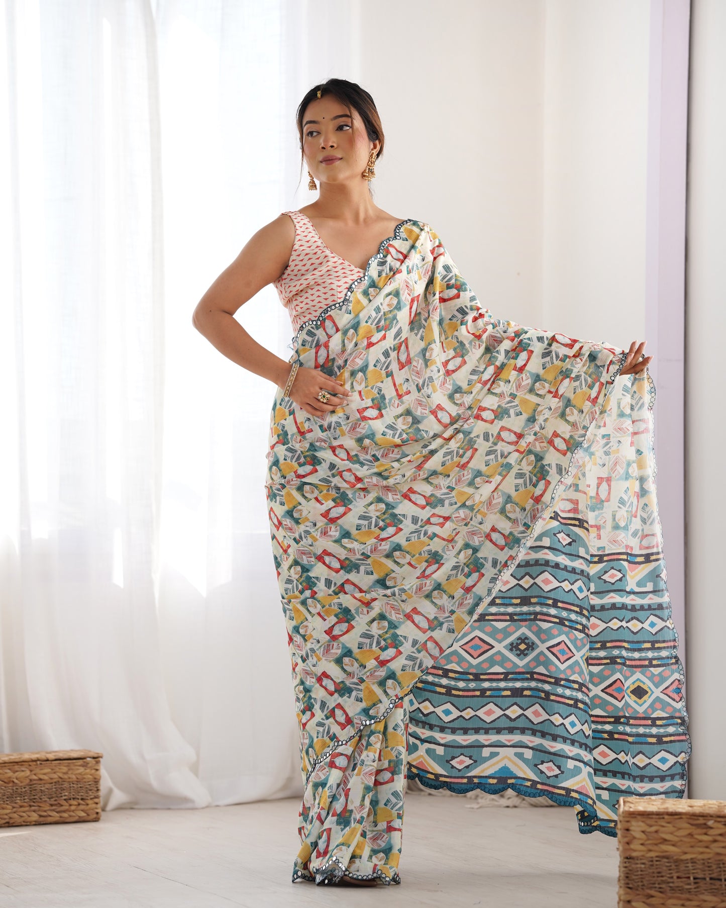 Cream Heavy Chinnon Saree with Print and Kutchi Mirror Lace Border