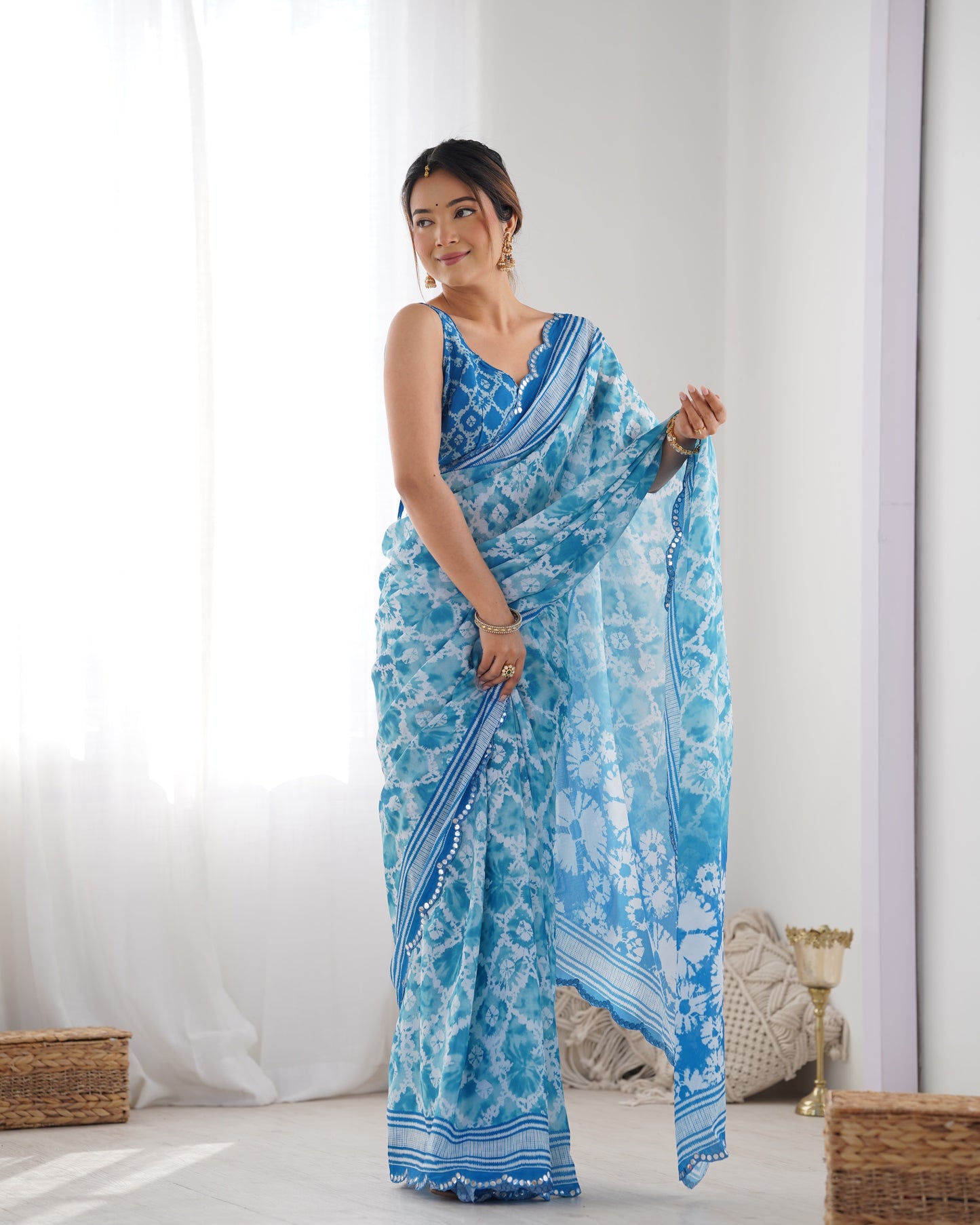 Sky Blue Heavy Chinnon Saree with Print Work and Beautiful Kutchi Work Mirror Lace Border