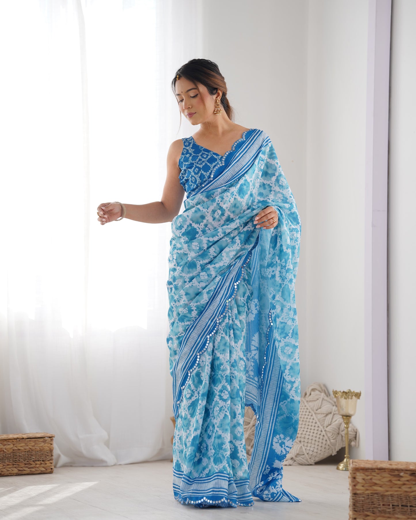 Sky Blue Heavy Chinnon Saree with Print Work and Beautiful Kutchi Work Mirror Lace Border