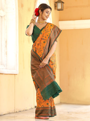 "Mustard Bottle Green Banarasi Saree with Floral Zari Weaving – Available"