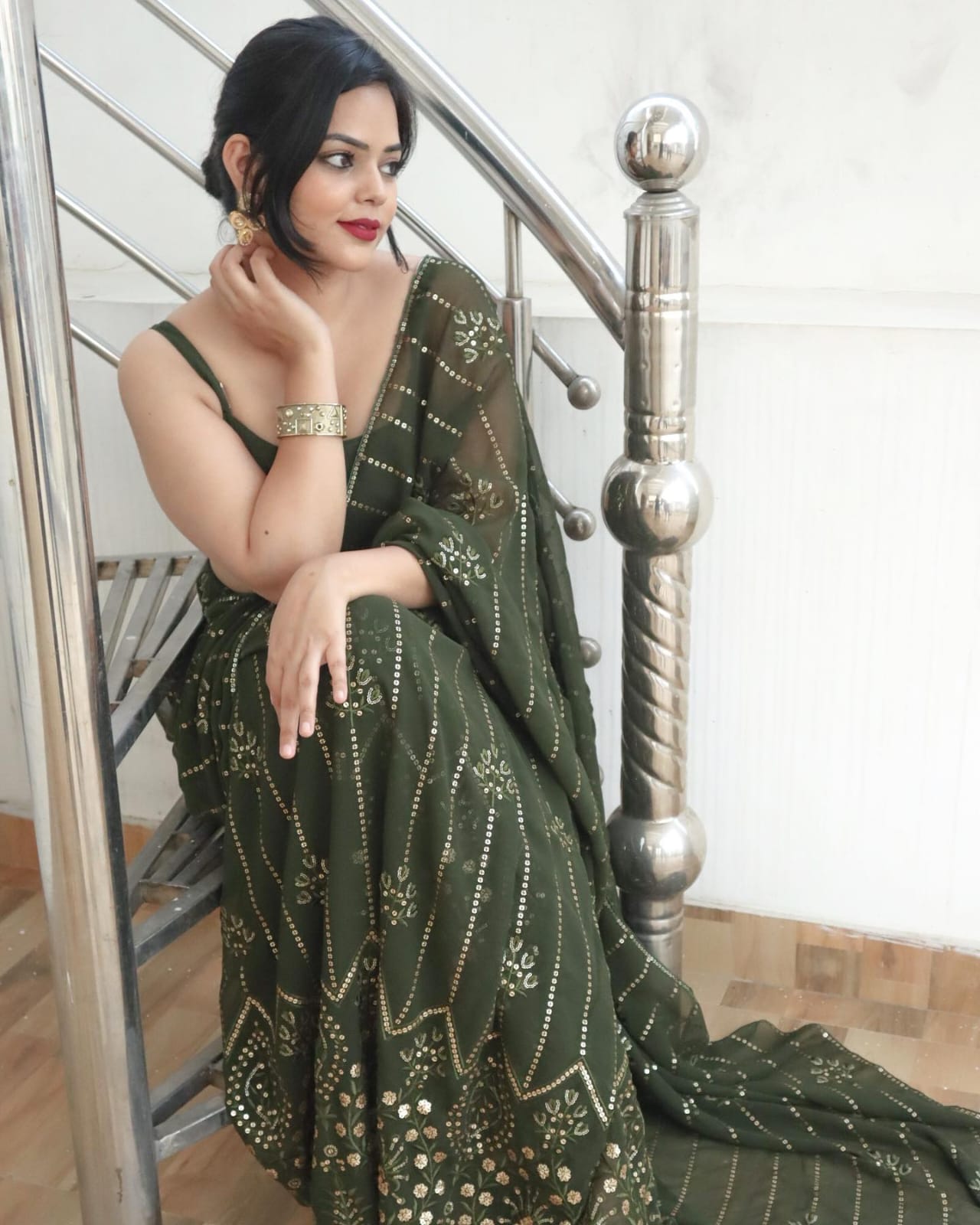 Dark Green Georgette Saree with Embroidery Sequence and Piping Lace