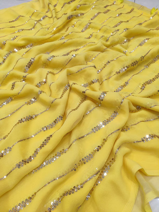 Yellow Georgette Saree with Embroidery Sequence and Tassels