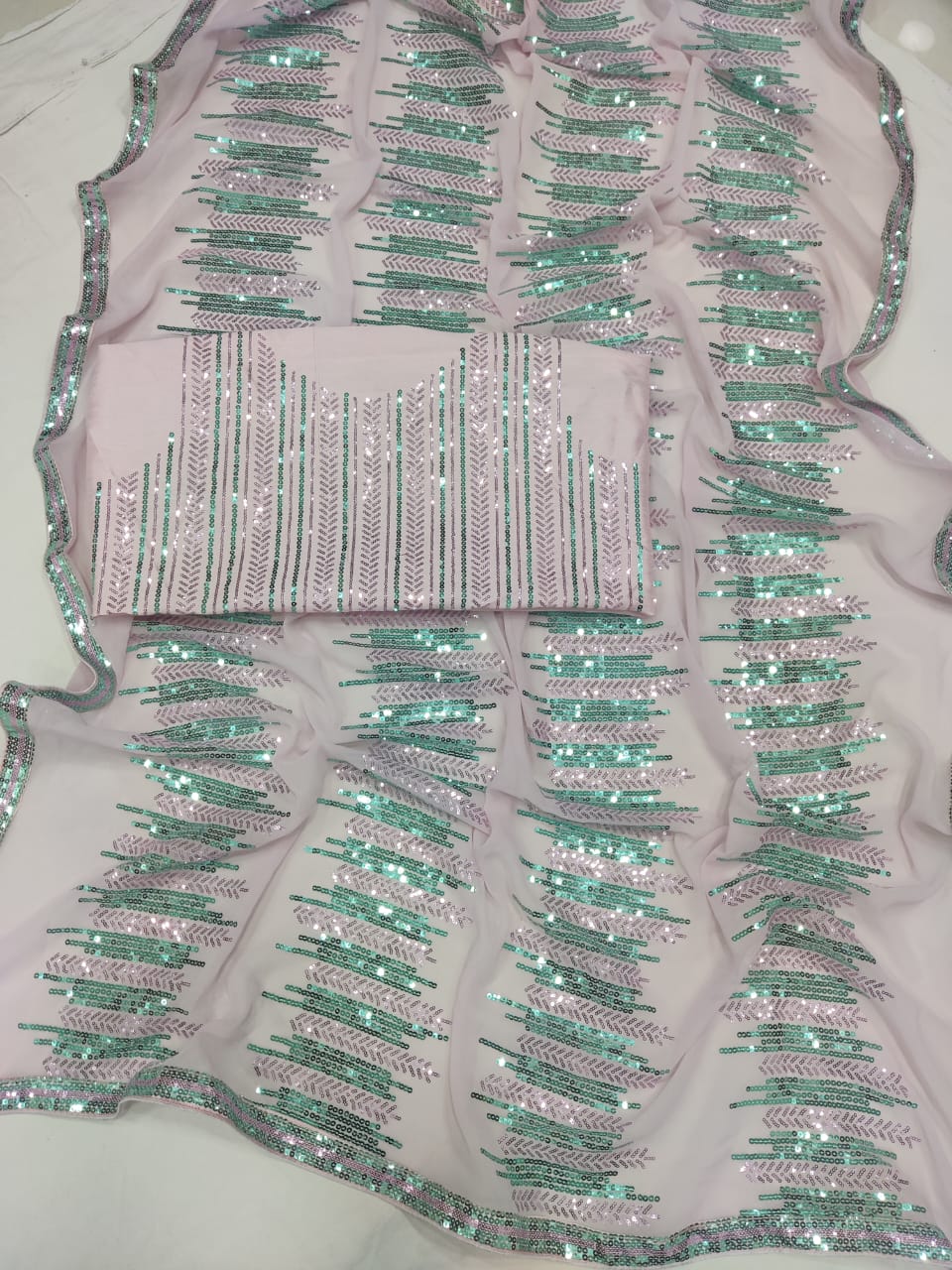 Pink Georgette Saree with Coordinated Sequence Embellishment and Lace – Available