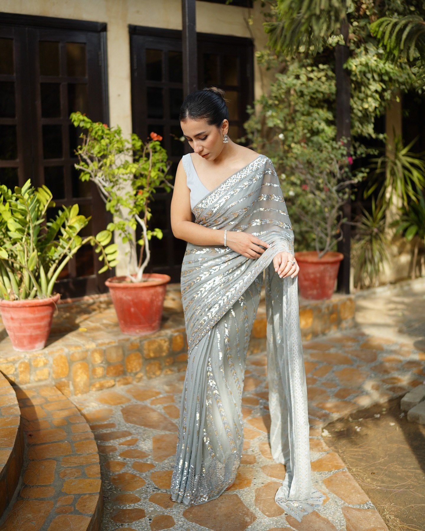 Silver Georgette Saree with Dual sequence embroidery lace with piping