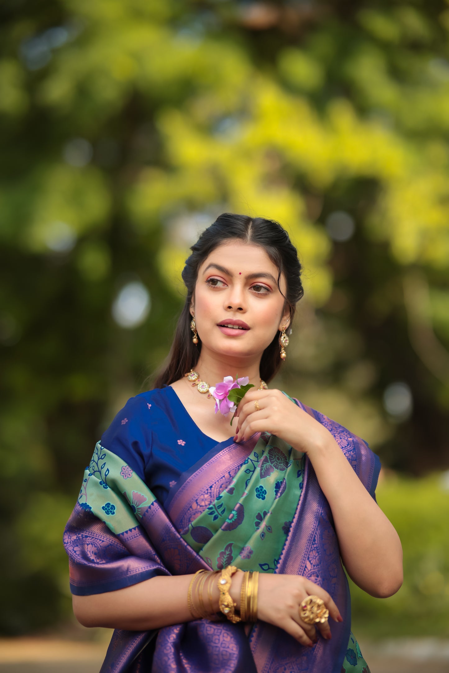 Peach Rama Litchi Soft Silk Banarasi Saree with Floral Zari Woven