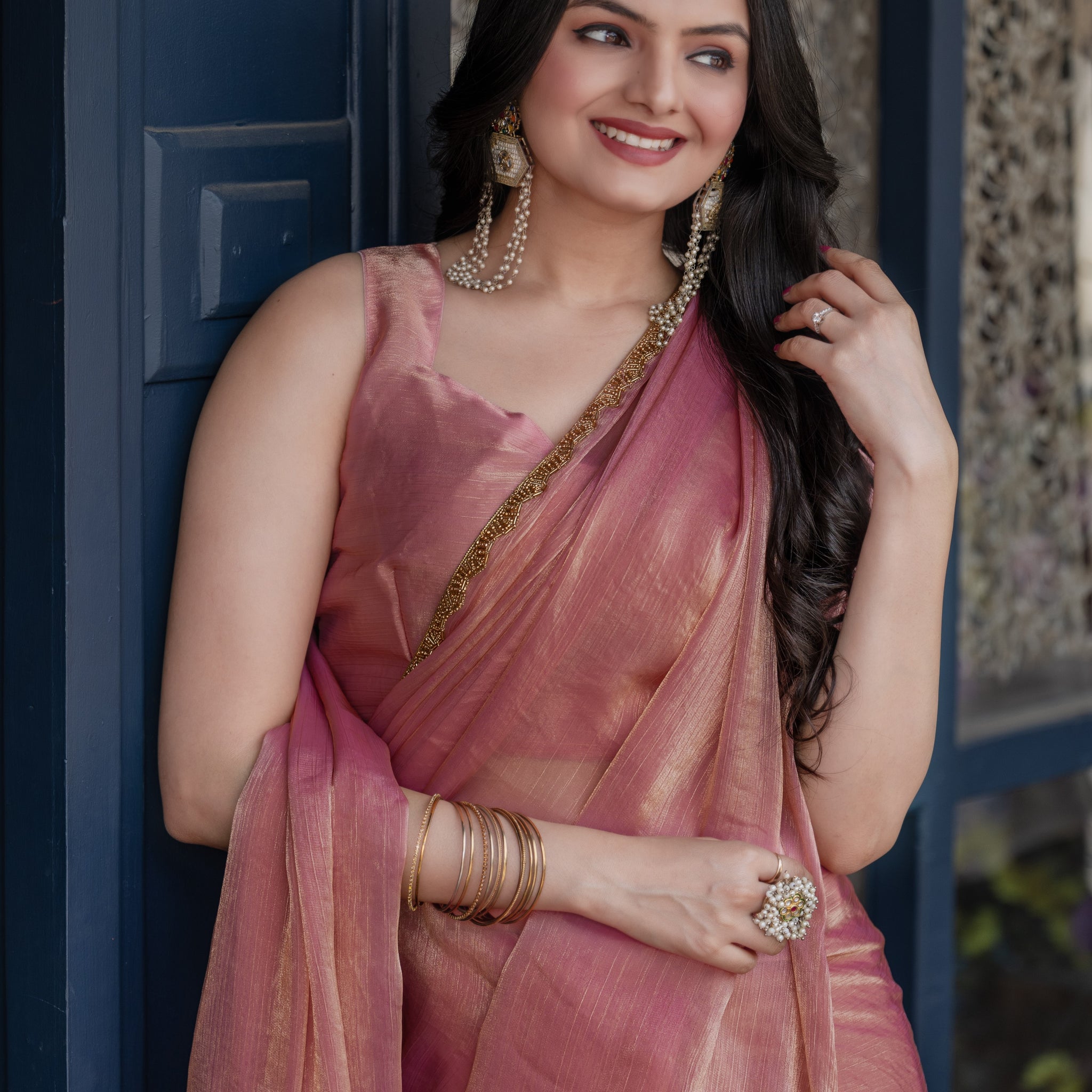 "Pink Chiffon Bollywood Saree with Embellished Details – Available"