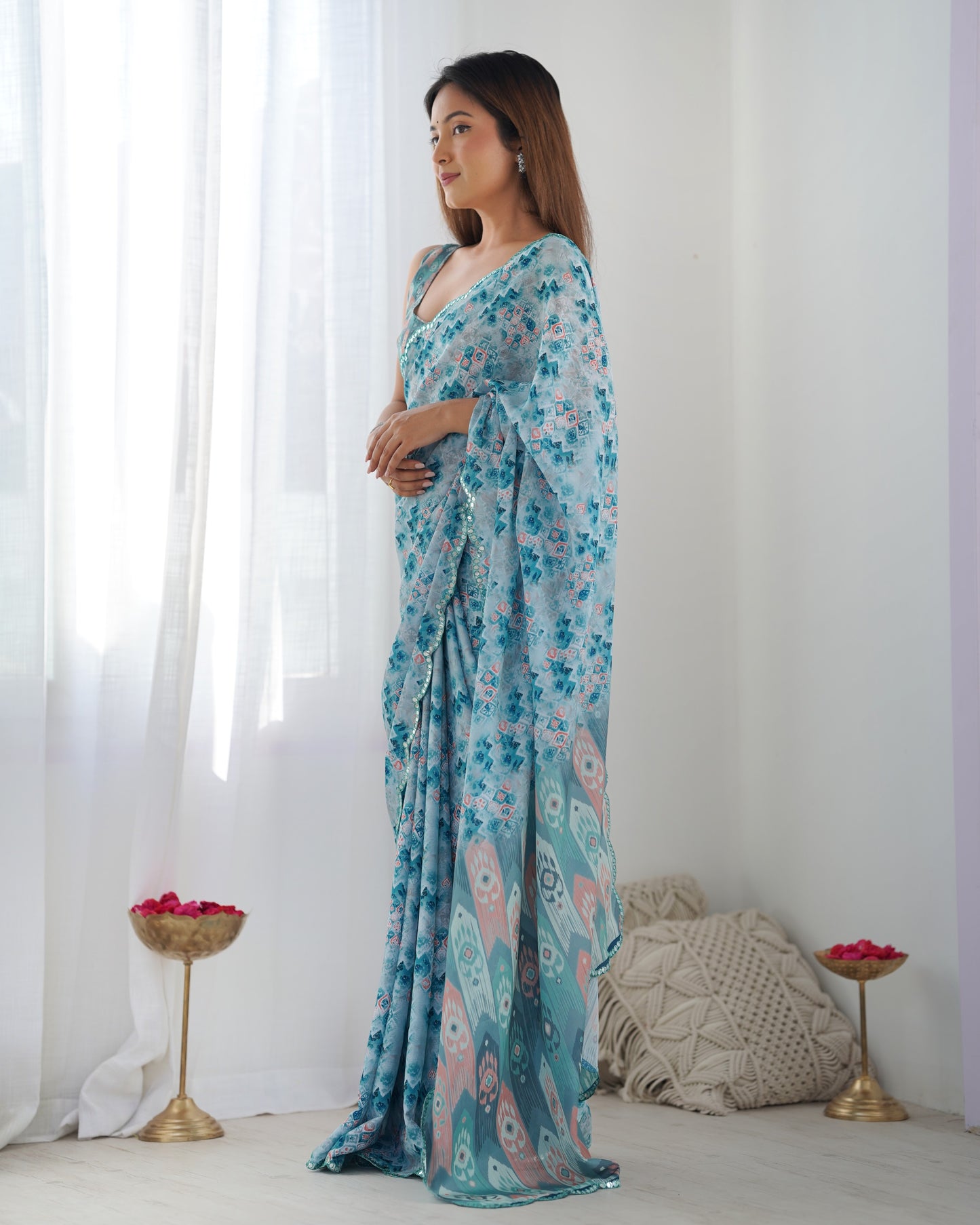 Sky Blue Heavy Chinnon Saree with Print and Kutchi Mirror Lace Border