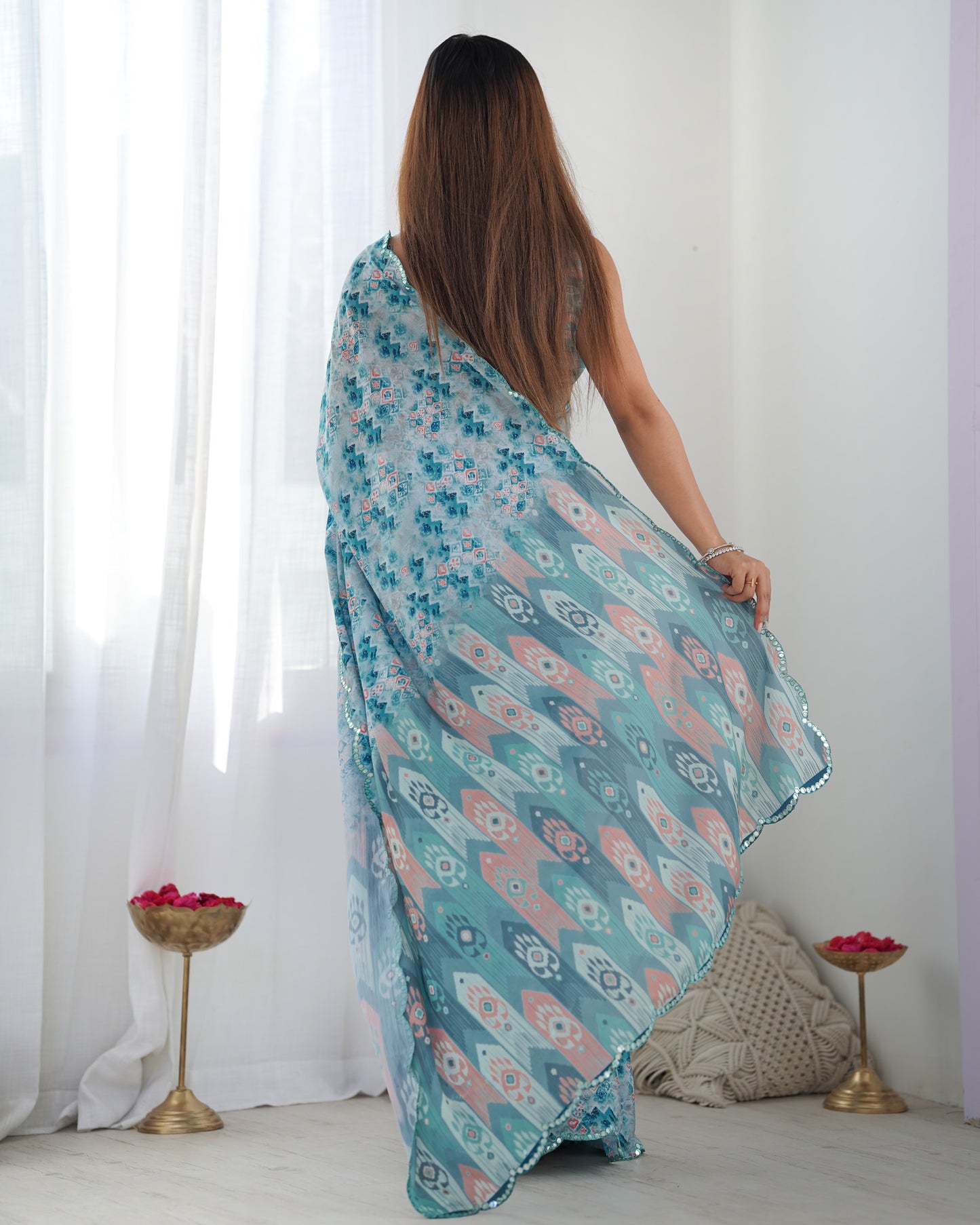 Sky Blue Heavy Chinnon Saree with Print and Kutchi Mirror Lace Border