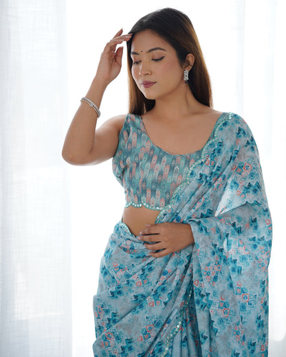 Sky Blue Heavy Chinnon Saree with Print and Kutchi Mirror Lace Border