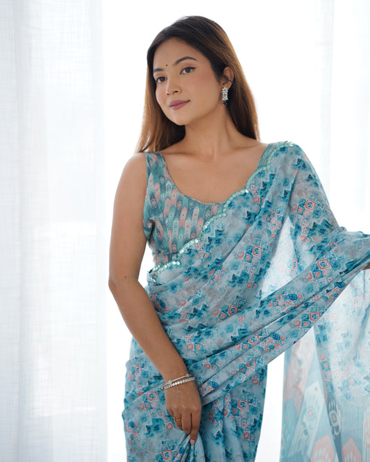 Sky Blue Heavy Chinnon Saree with Print and Kutchi Mirror Lace Border