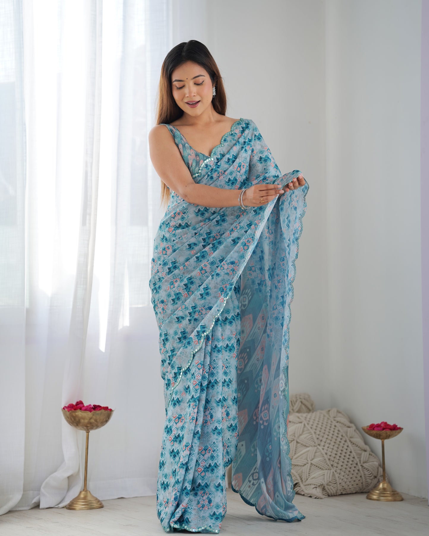 Sky Blue Heavy Chinnon Saree with Print and Kutchi Mirror Lace Border