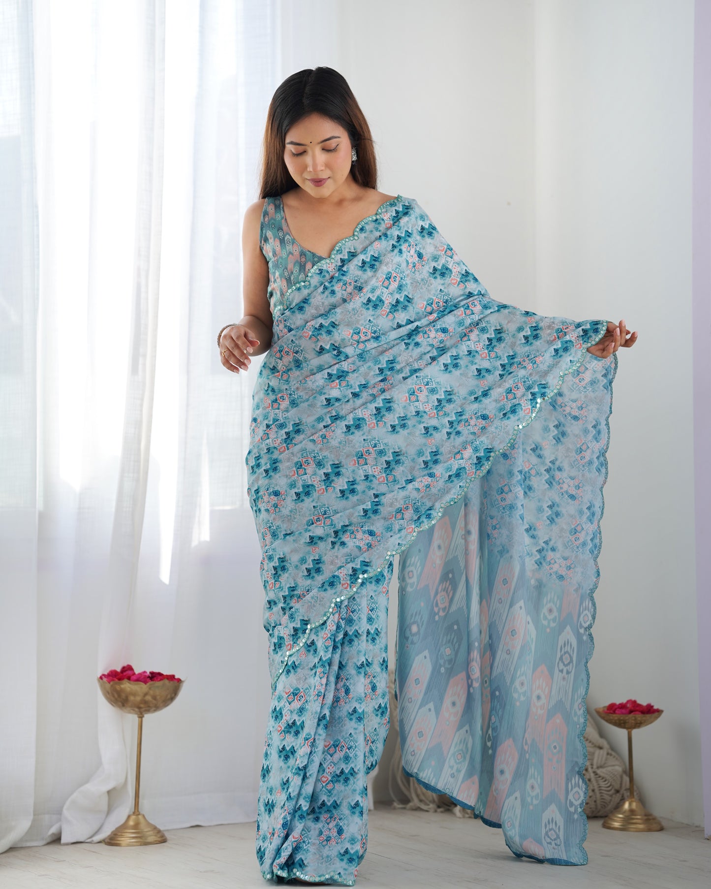 Sky Blue Heavy Chinnon Saree with Print and Kutchi Mirror Lace Border