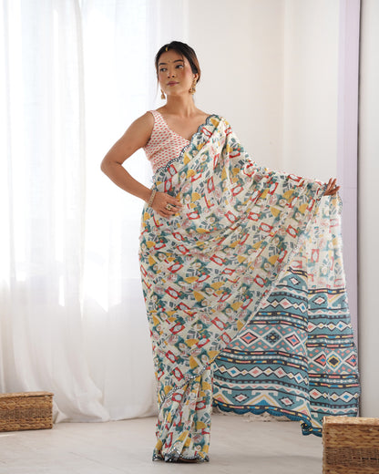 Cream Heavy Chinnon Saree with Print and Kutchi Mirror Lace Border