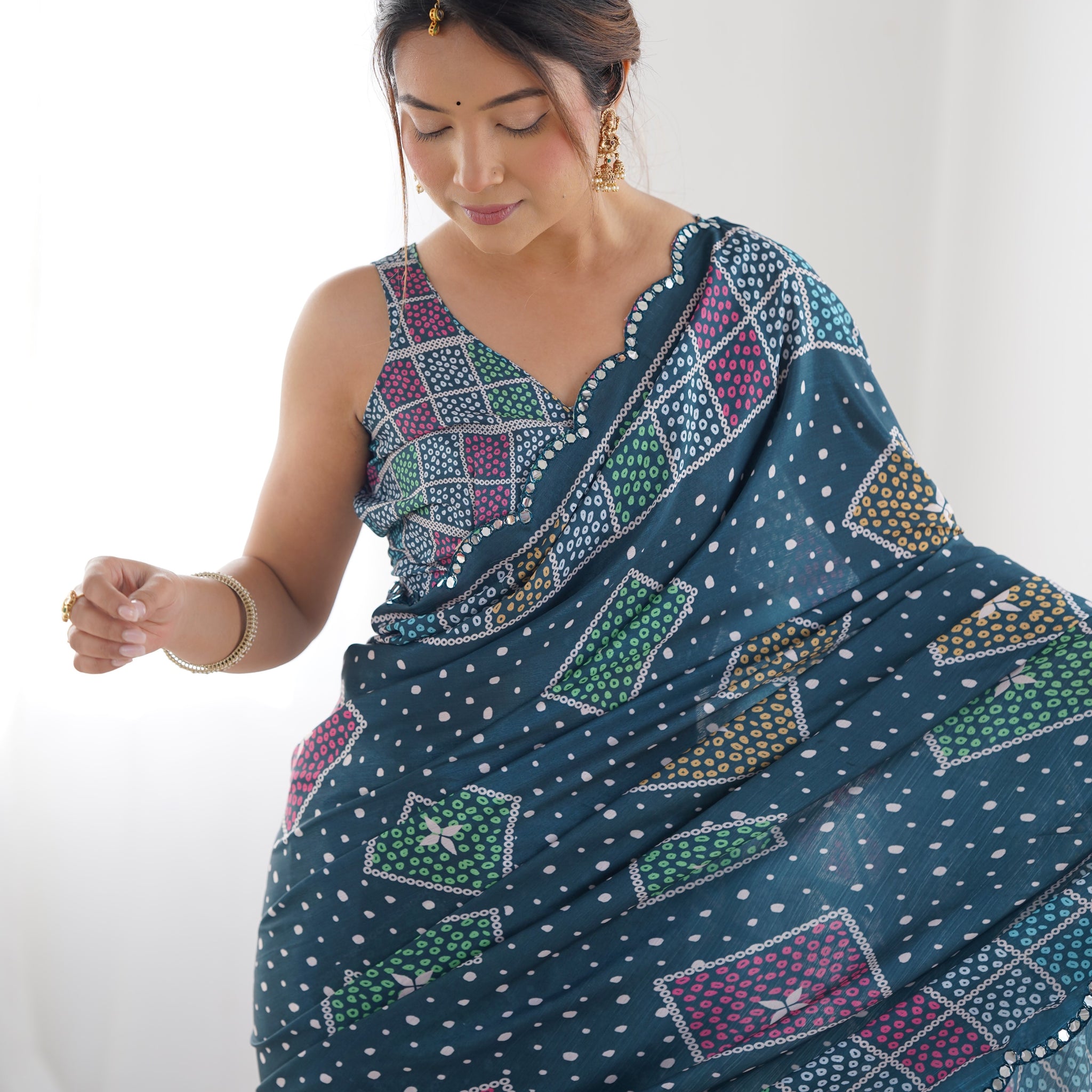 Navy Blue Chinnon Saree with Kutchi Mirror Border and Traditional Print – Available