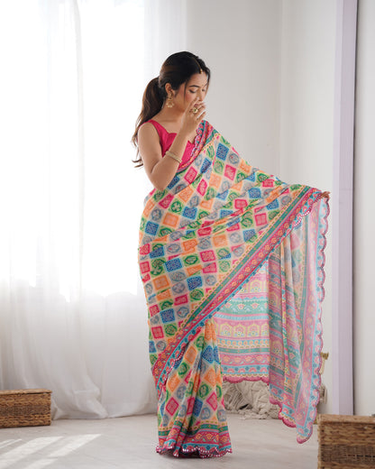 White Heavy Chinnon Saree with Print Work and Beautiful Kutchi Work Mirror Lace Border