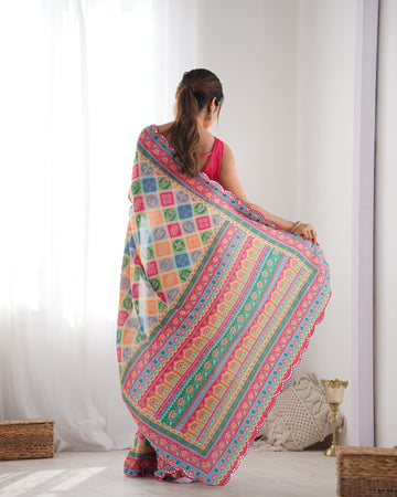 White Chinnon Saree with Kutchi Mirror Border and Printed Work – Available