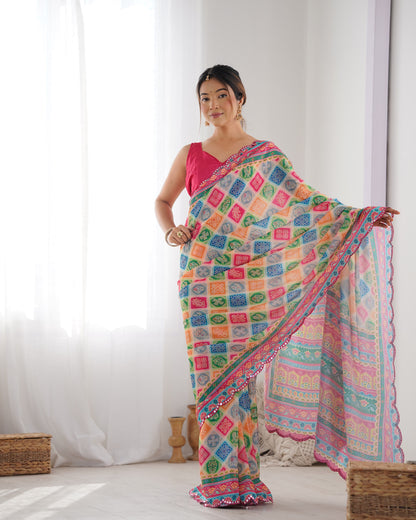 White Heavy Chinnon Saree with Print Work and Beautiful Kutchi Work Mirror Lace Border