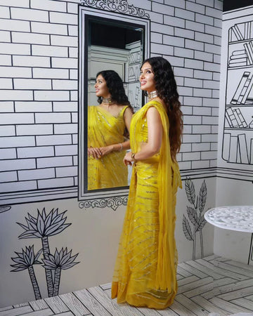 Yellow Georgette Saree with Tassel Detail and Embroidery – Available