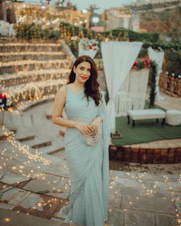 Pastel Blue Georgette Saree with Sirosky Work and Lace Border – Available